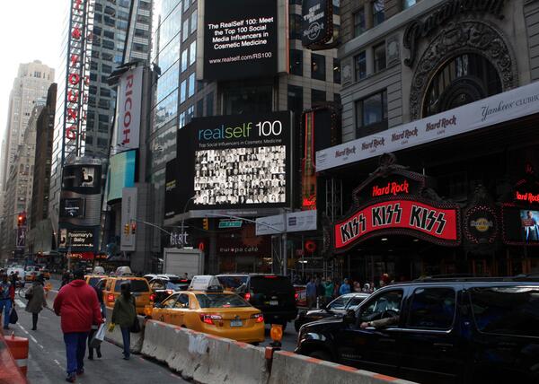 Dr. Kerr's Photo on Display in Times Square with the other winners of the Realself 100 award