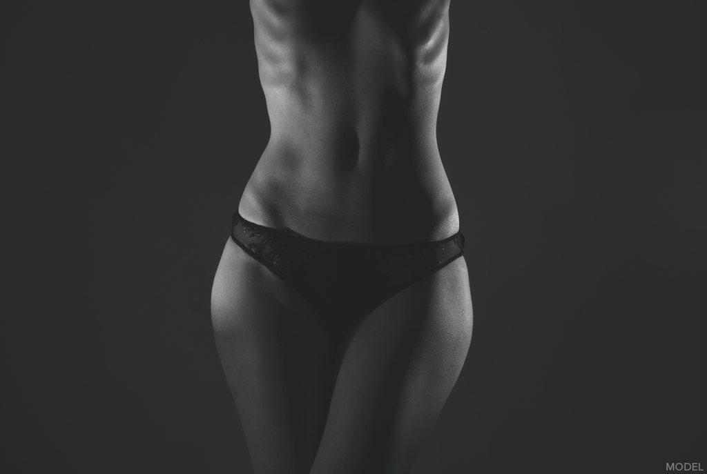 Achieve a smoother stomach with a liposuction.