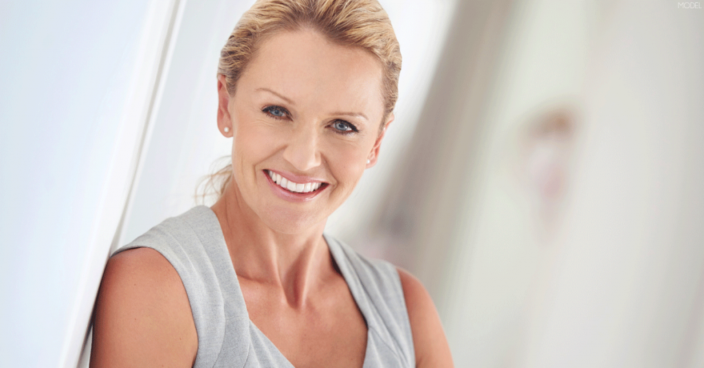 Woman demonstrating the results possible from a facelift