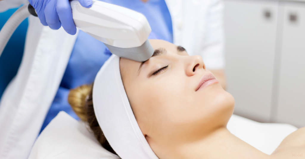 Woman receiving laser skin treatment