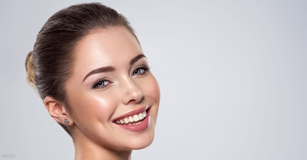 Smiling woman with beautiful skin (model)